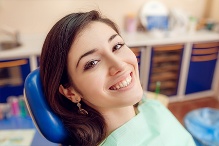 Smiling woman in dental chair