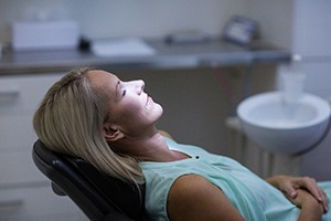 Woman relaxing with oral conscious dental sedation in Mesquite